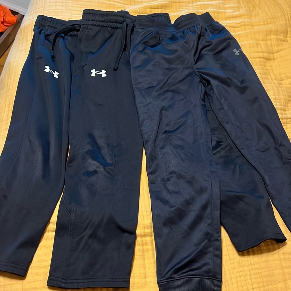 Three pair Under Armour pants. Size S and 7